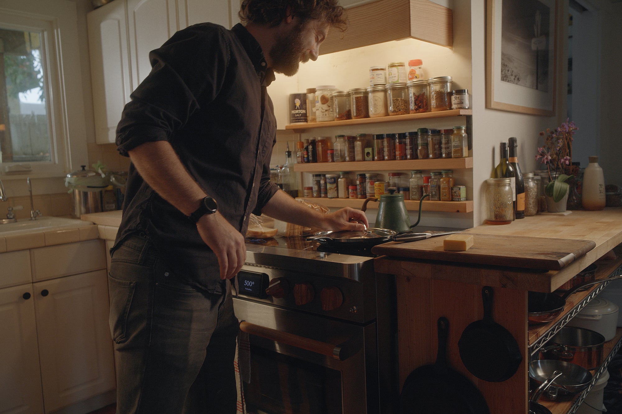Load video: Sam Calisch, founder and CEO of Copper makes coffee, grilled cheese, and pizza on the new, more powerful Charlie induction range as he speaks about the development of the product and why electrification is important.
